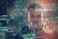 Composite image of portrait of hacker using digital screen Royalty Free Stock Photo