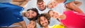 Composite image of portrait of happy friends huddling against clear sky Royalty Free Stock Photo