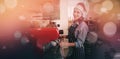 Composite image of portrait of happy waitress wearing santa hat Royalty Free Stock Photo