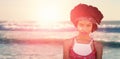 Composite image of portrait of hippie woman with headband