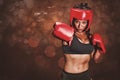 Composite image of portrait of pretty boxer with fighting stance Royalty Free Stock Photo