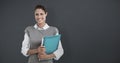 Composite image of portrait of smiling businesswoman holding file folder Royalty Free Stock Photo