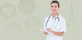 Composite image of portrait of smiling female doctor writing on clipboard Royalty Free Stock Photo