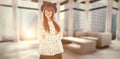Composite image of portrait of a smiling hipster woman with arms crossed Royalty Free Stock Photo