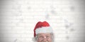 Composite image of portrait of smiling santa claus Royalty Free Stock Photo