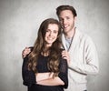 Composite image of portrait of smiling young couple Royalty Free Stock Photo