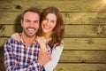 Composite image of portrait of young couple smiling Royalty Free Stock Photo