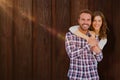 Composite image of portrait of young couple smiling Royalty Free Stock Photo