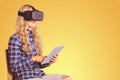 Composite image of pretty casual worker using oculus rift Royalty Free Stock Photo