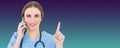 Composite image of pretty woman doctor phoning and pointing with her finger Royalty Free Stock Photo