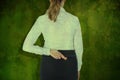 Composite image of rear view of businesswoman with fingers crossed over white background Royalty Free Stock Photo