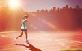 Composite image of rear view of sportswoman running on a white background Royalty Free Stock Photo
