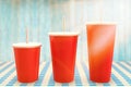 Composite image of red cups over white background Royalty Free Stock Photo