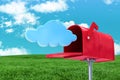 Composite image of red email postbox Royalty Free Stock Photo