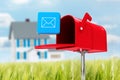 Composite image of red email postbox Royalty Free Stock Photo