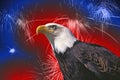 Composite image of a red, white and blue glowing bald eagle and fireworks