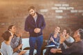 Composite image of rehab group applauding delighted man standing up