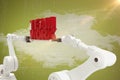 Composite image of robotic hand holding red team work text over white background Royalty Free Stock Photo