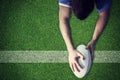 Composite image of a rugby player scoring a try Royalty Free Stock Photo