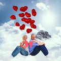 Composite image of sad mature couple holding a broken heart Royalty Free Stock Photo