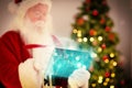 Composite image of santa checking his list Royalty Free Stock Photo