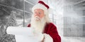 Composite image of santa claus checking his list Royalty Free Stock Photo