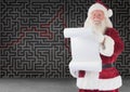 Composite image of santa claus holding a list against maze on grey background Royalty Free Stock Photo