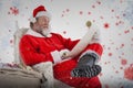 Composite image of santa claus reading wish list on scroll against white background Royalty Free Stock Photo