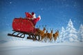 Composite image of santa claus riding on sleigh with gift box Royalty Free Stock Photo