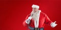 Composite image of santa claus singing song Royalty Free Stock Photo