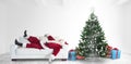 Composite image of santa claus taking a nap Royalty Free Stock Photo