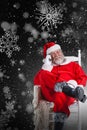 Composite image of santa claus talking on mobile phone Royalty Free Stock Photo