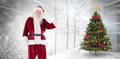 Composite image of santa shows something to camera Royalty Free Stock Photo