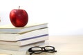 Composite image of school supplies on desk, Apple, books and glasses on the desktop