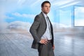 Composite image of serious businessman with hand on hip Royalty Free Stock Photo