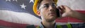 Composite image of serious construction worker on the phone Royalty Free Stock Photo