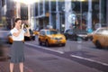 Composite image of serious elegant businesswoman looking through binoculars Royalty Free Stock Photo