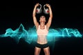 Composite image of serious female crossfitter lifting kettlebells above head