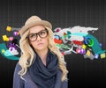 Composite image of serious trendy blonde with classy glasses posing Royalty Free Stock Photo