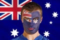 Composite image of serious young australia fan with facepaint Royalty Free Stock Photo