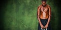 Composite image of shirtless fit young man lifting kettle bell Royalty Free Stock Photo