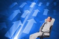 Composite image of side view of businessman in his chair Royalty Free Stock Photo