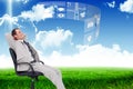 Composite image of side view of businessman leaning back in his chair Royalty Free Stock Photo