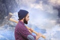 Composite image of side view of hipster with axe Royalty Free Stock Photo