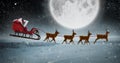 Composite image of side view of santa claus riding on sleigh during christmas Royalty Free Stock Photo