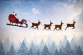 Composite image of side view of santa claus riding on sleigh during christmas