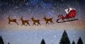 Composite image of side view of santa claus riding on sleigh during christmas Royalty Free Stock Photo