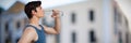 Composite image of side view of young man drinking water Royalty Free Stock Photo