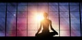 Composite image of silhouette image of female practicing meditation Royalty Free Stock Photo