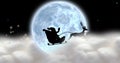 Composite image of silhouette santa sleigh against full moon at night with copy space Royalty Free Stock Photo